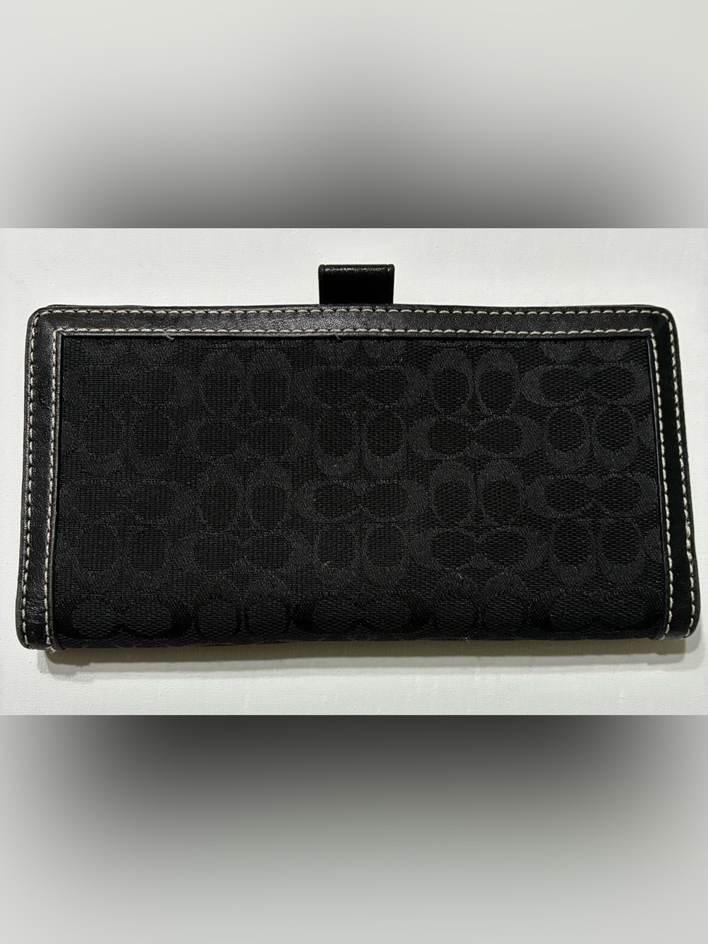 vintage Coach
Signature jacquard checkbook cover Canvas & leather